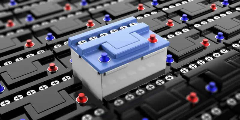 Solid-State Batteries Tesla Is Betting On: What You Need To Know 3 One Solid-State Battery With Blue And Red Terminals Standing Out Among Many Black Batteries