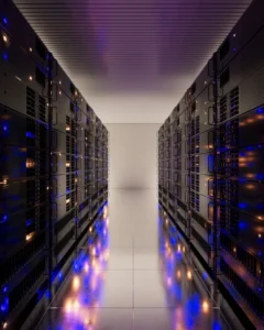 Ai Agents For Small Business: Practical Automation Every Colorado Company Can Use Today 3 Enterprise Data Center Aisle With High-Density Server Racks, Led Status Lighting, And Mirrored Floor For Secure Infrastructure Hosting