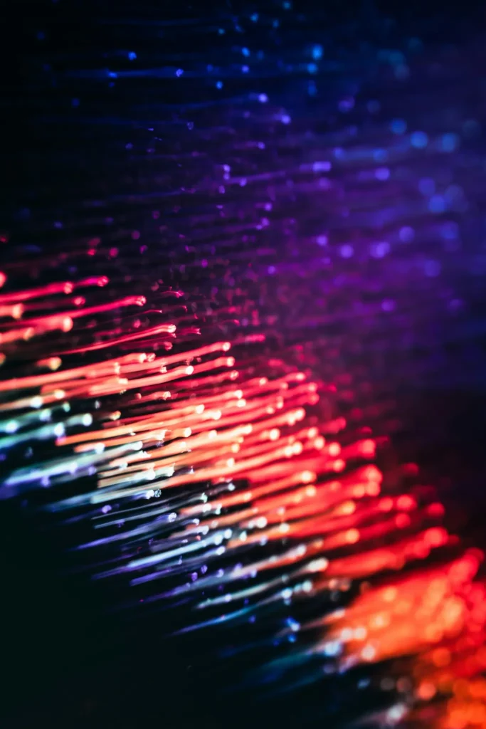 Denver Cybersecurity In 2026: Why Cyber Insurance Just Raised The Bar For Every Small Business 5 Illuminated Fiber-Optic Cables Representing Business Data And Cybersecurity