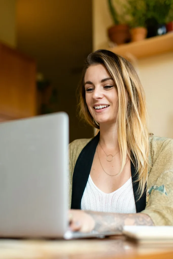 Microsoft Publisher Alternatives: The 10 Best Options For Small Businesses In 2026 7 Business Owner Researching Microsoft Publisher Alternatives On Her Laptop