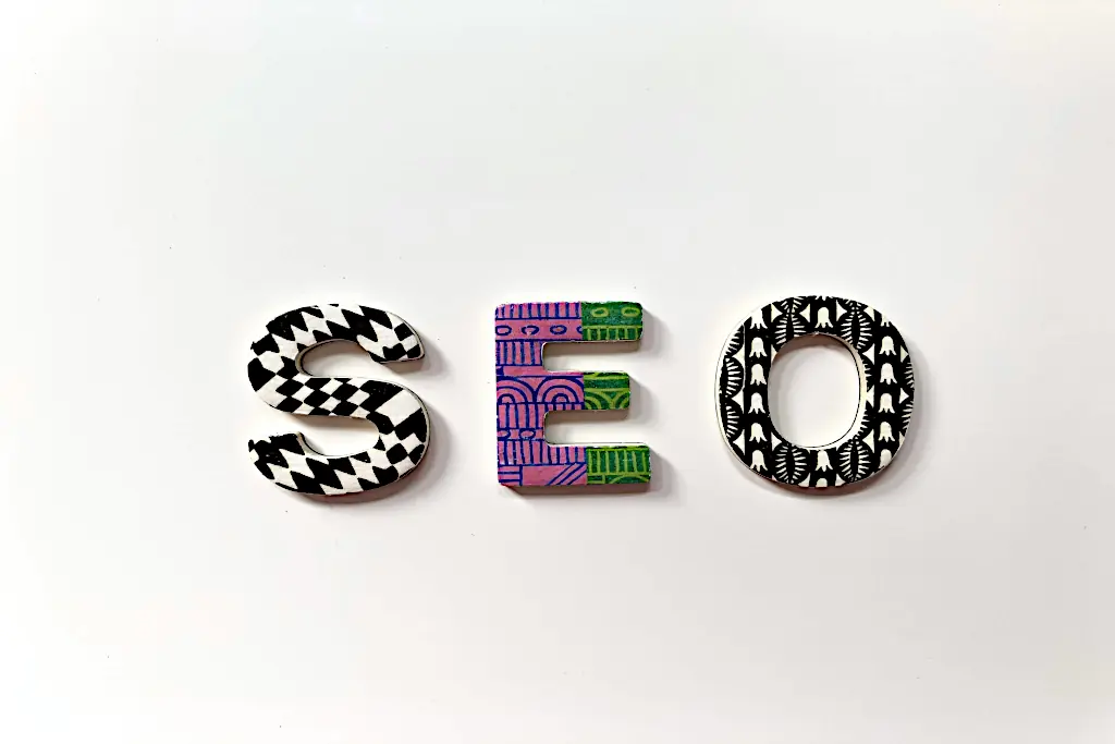 Decorative letters spelling out SEO on a white background.