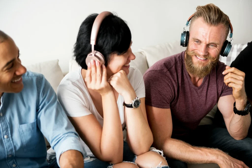 Cd To Digital Format 8 Three Friends Sitting On A Couch Enjoying Music With Over-Ear Headphones