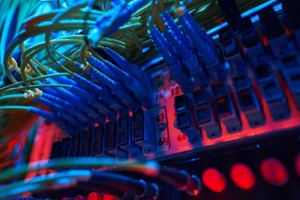 Firewall Protection For Small Business: Stop Ransomware Before It Starts 6 Close-Up Of Network Cables And Firewall Hardware For Cybersecurity Protection